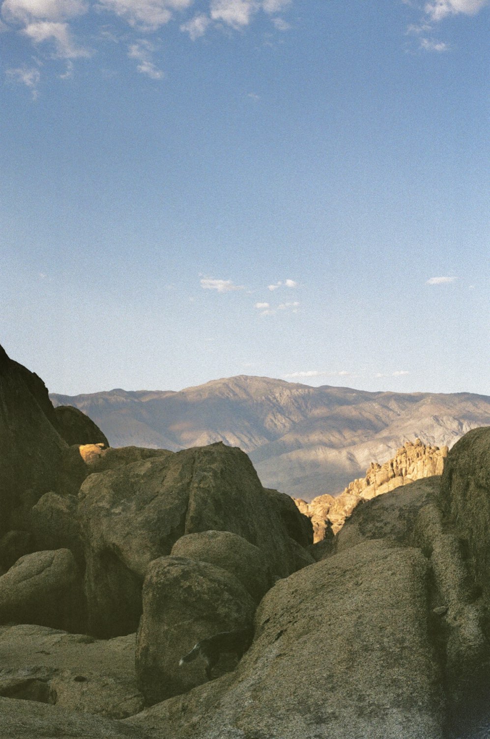 Weathered boulders under a blue sky